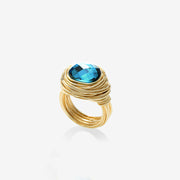 Bague cabochon dorée avec sa topaze blue London bijou créateur et fantaisie pour femme